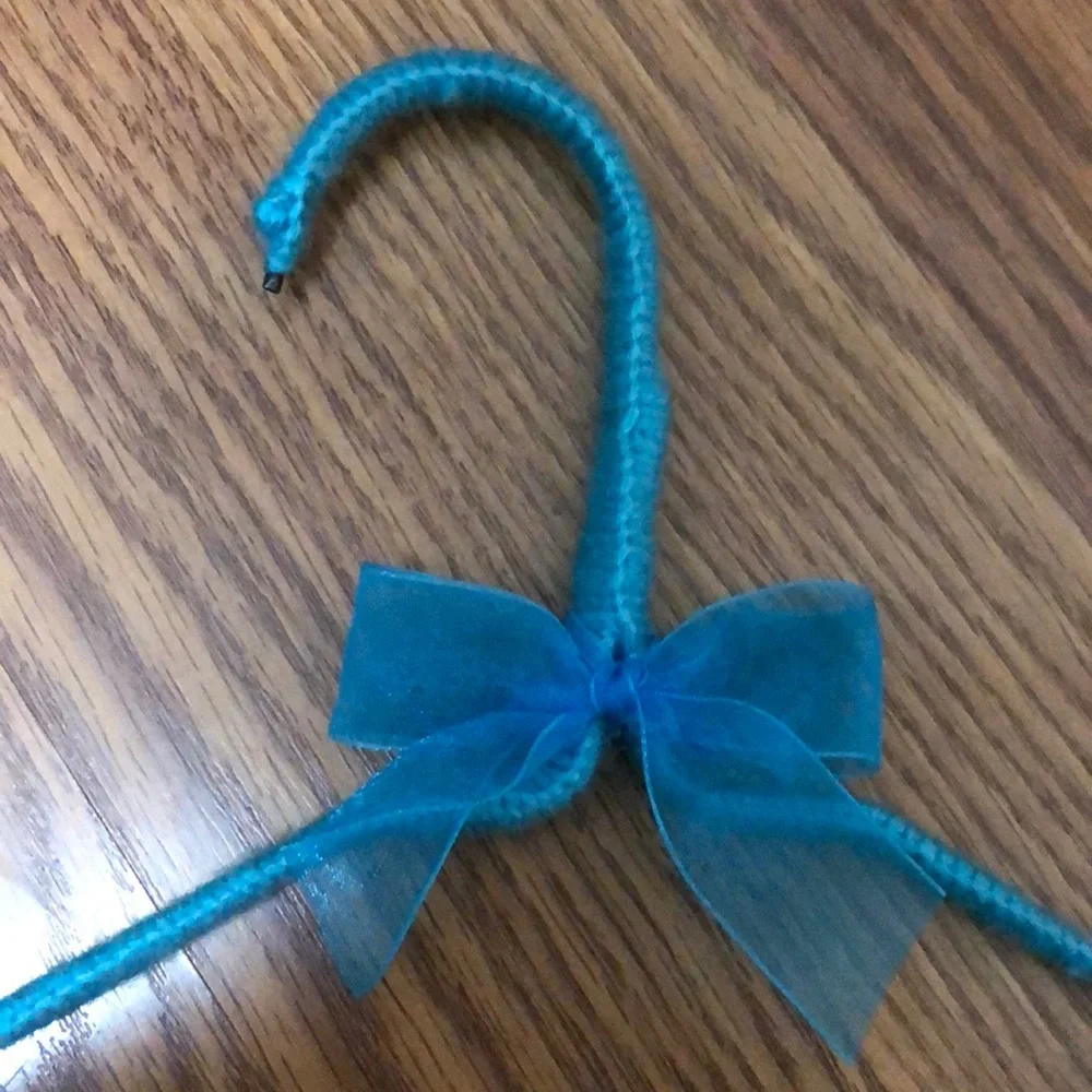 3 yarn covered hangers